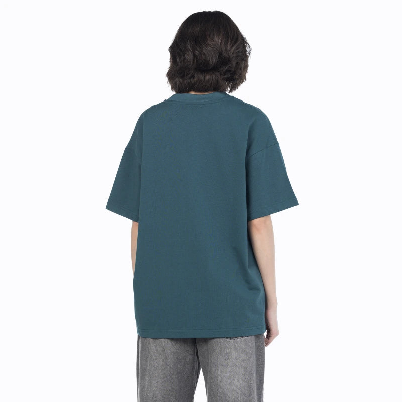 Female model wearing a vintage blue premium cotton oversized heavy jersey from Intersect collection