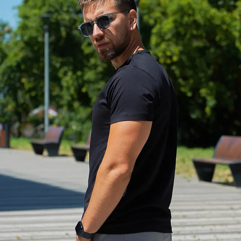 Model wearing a black Giza Egyptian cotton shirt with a tailored fit by Intersect Collection