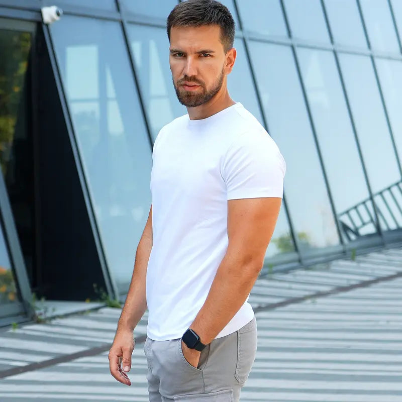 Model wearing a white Giza Egyptian cotton t-shirt with a tailored fit by Intersect Collection